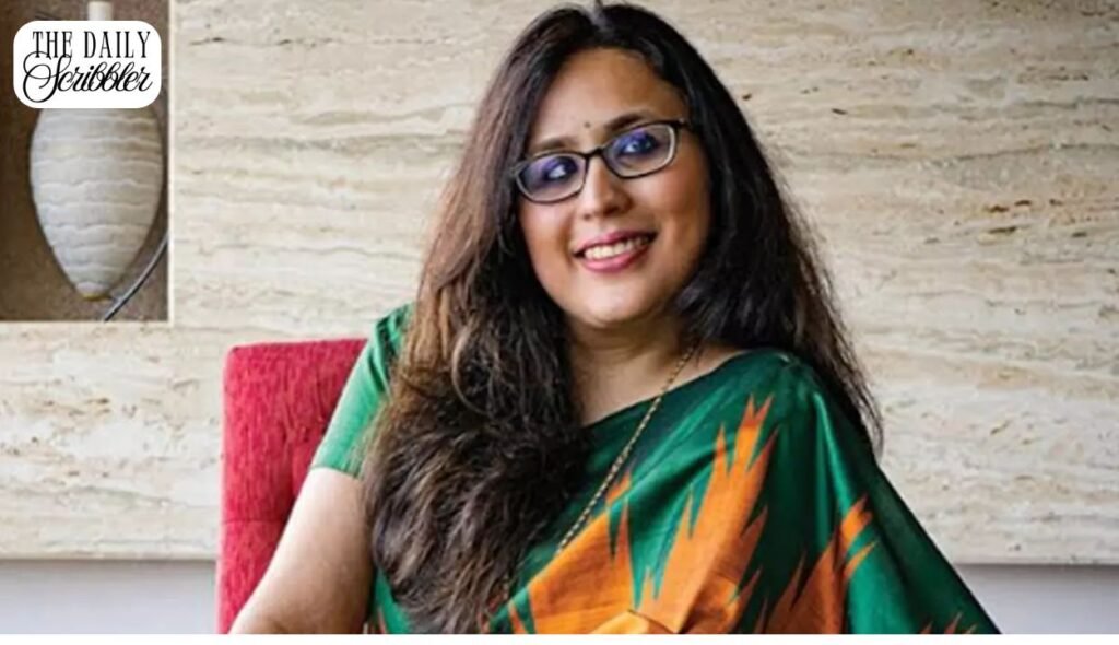 Radhika Gupta sitting on Shark Tank India panel in saree